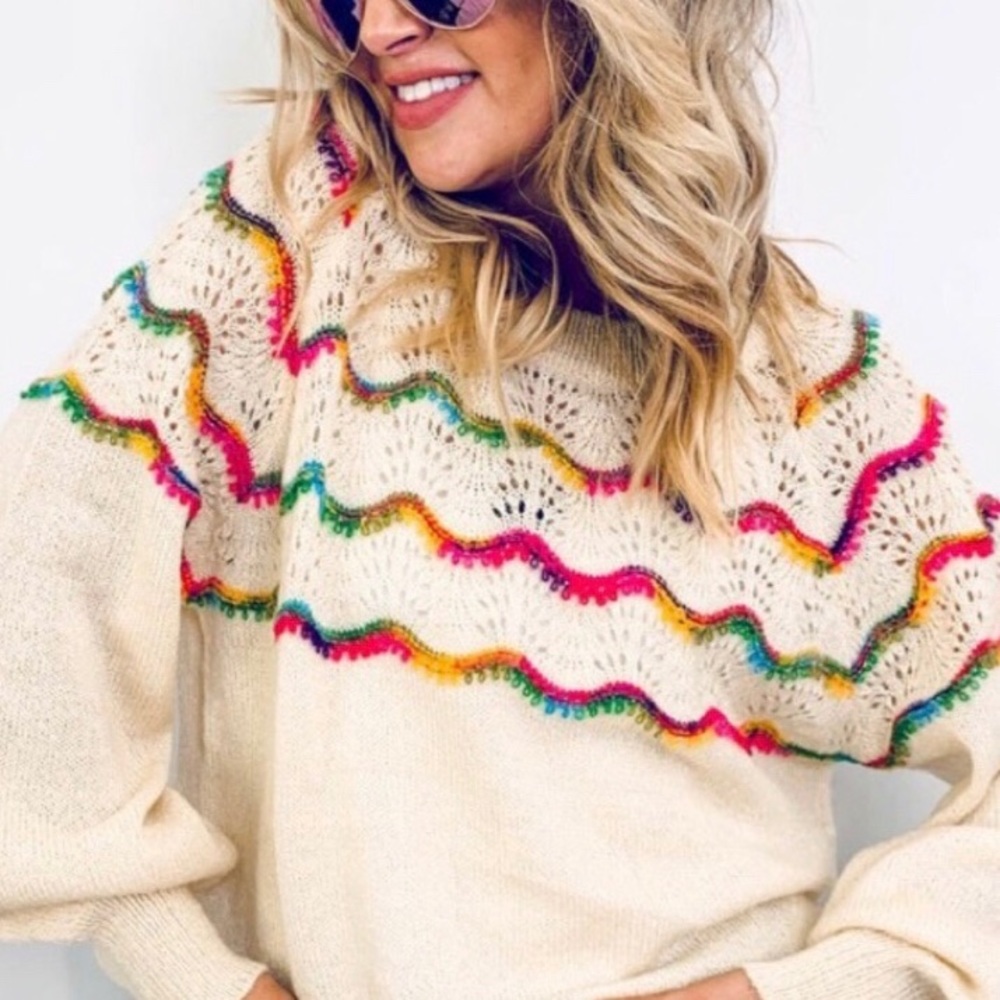 Beige soft sweater! With colored stitches.
